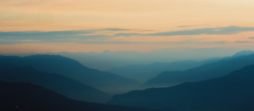 Silhouette of Mountains during Sunset